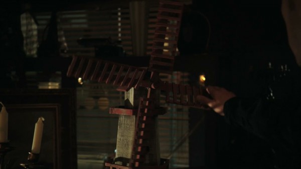 David with the windmill in Mr. Gold's pawn shop