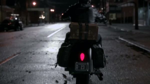 Stranger's motorcycle with license plate 23 (S01E09)