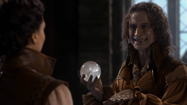 Rumplestiltskin holding crystal ball (The Doctor-2x05)