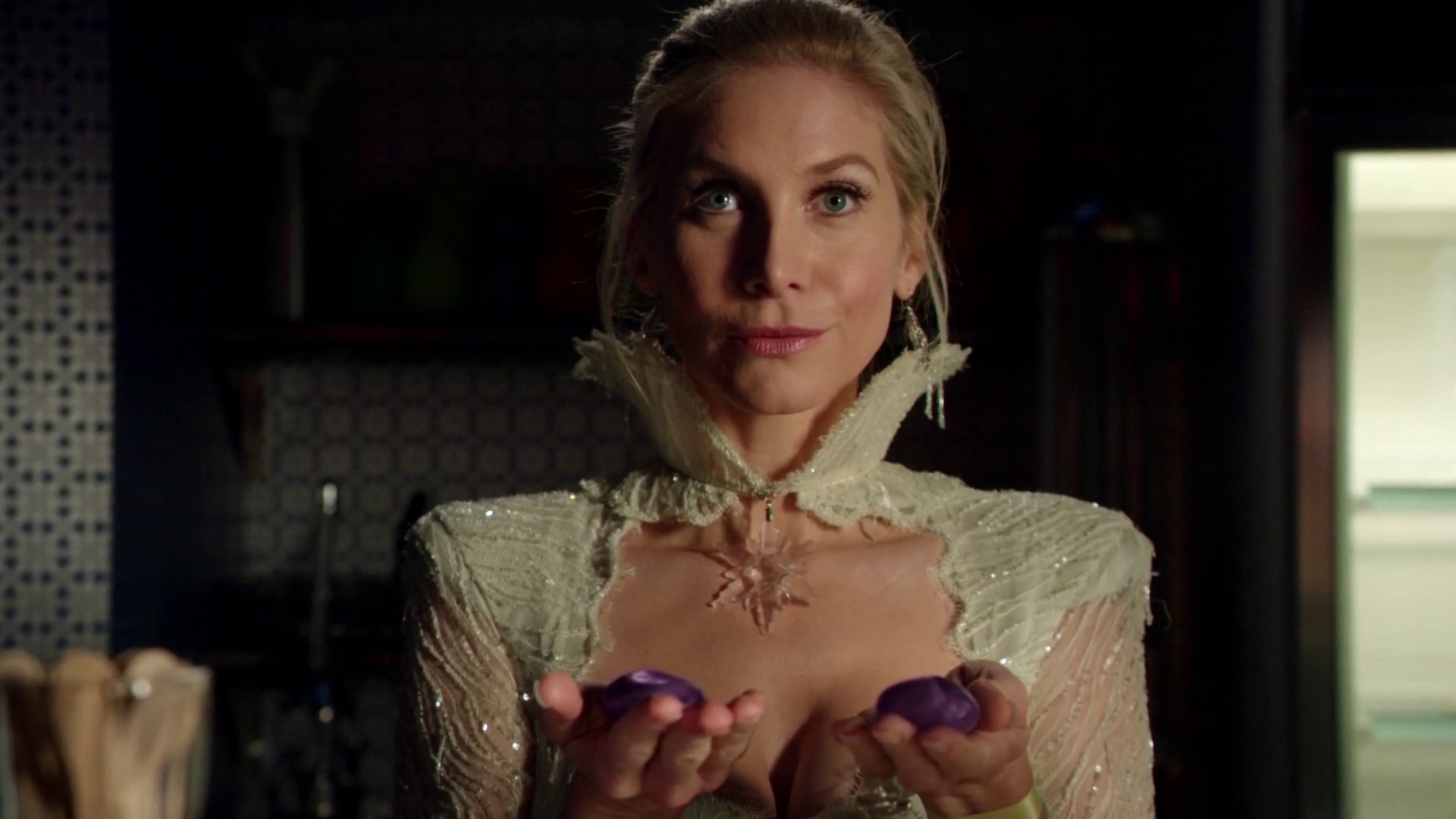 Once Upon a Time podcast 4x11 Shattered Sight - Ingrid Snow Queen holding Emma and Elsa's rock memories