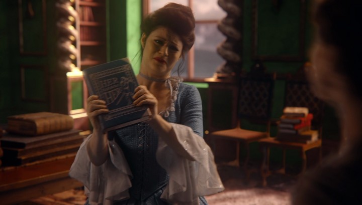 Once Upon a Time 5x17 Her Handsome Hero - Belle holding the book Her Handsome Hero from 4x06 Family Business